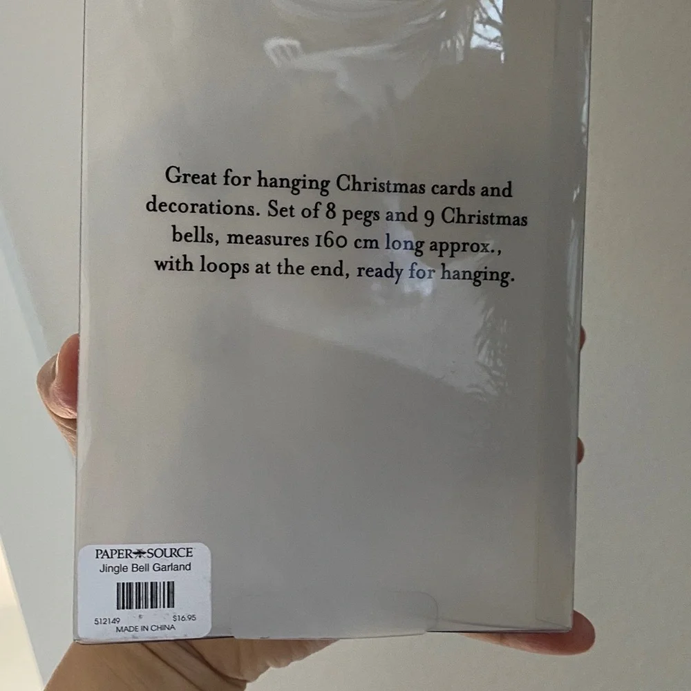 Paper Source gold jingle bell garland for Christmas cards or decorations